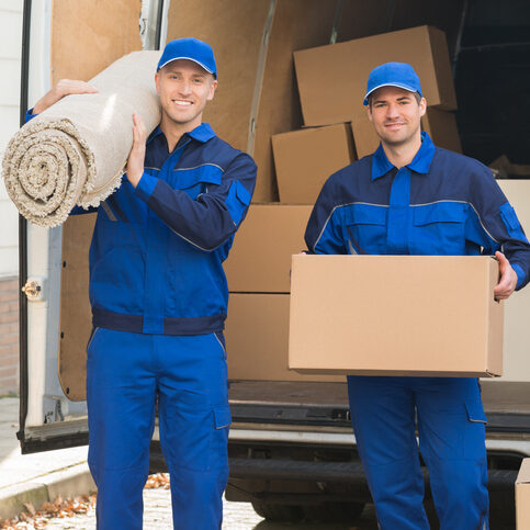 Happy Delivery Men Carrying Cardboard Box And Carpet | Luna Flooring Gallery